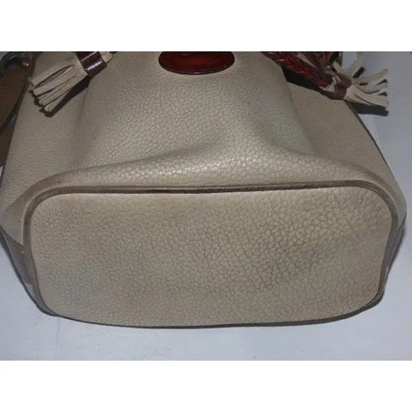 Early Dooney & Bourke, 'Teton' style, taupe, camel, brown leather, large, braided leather, drawstring top, cross body bag